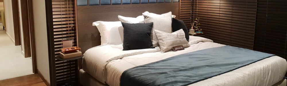 łóżko tapicerowane w sypialni
