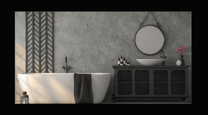 Czarna armatura w połączeniu z betonem sprawdzi się w łazienkach loft